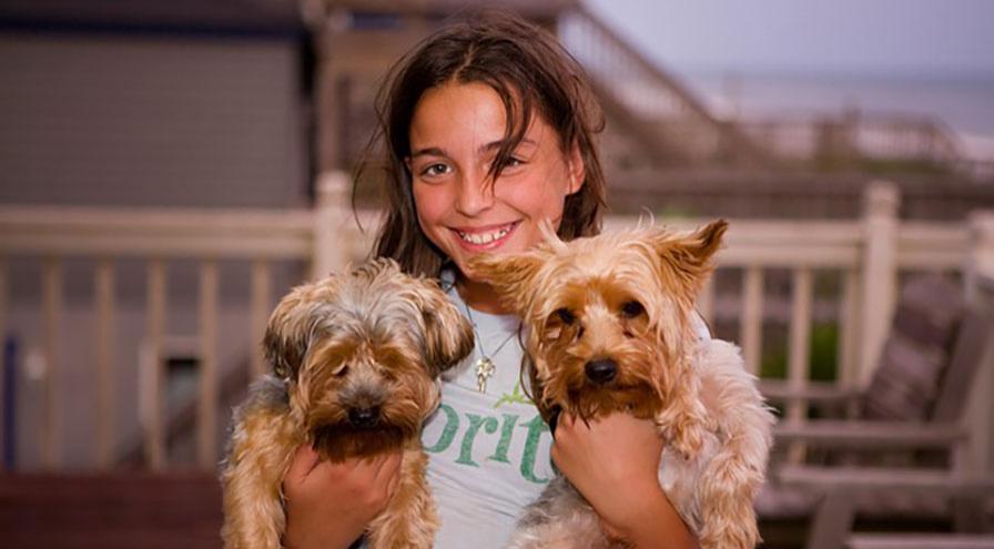 Child with dogs