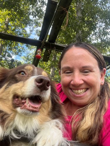 Allyson Oliveira with dog 500
